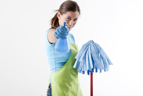 Airbnb cleaner preparing a Wimbledon short-let property for guest arrival