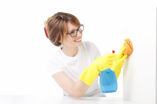 Professional cleaning of a commercial kitchen and washroom area